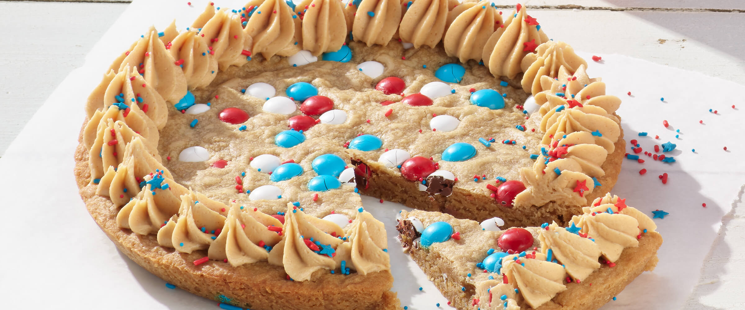 4th of July Cookie Pie on a white wooden table.