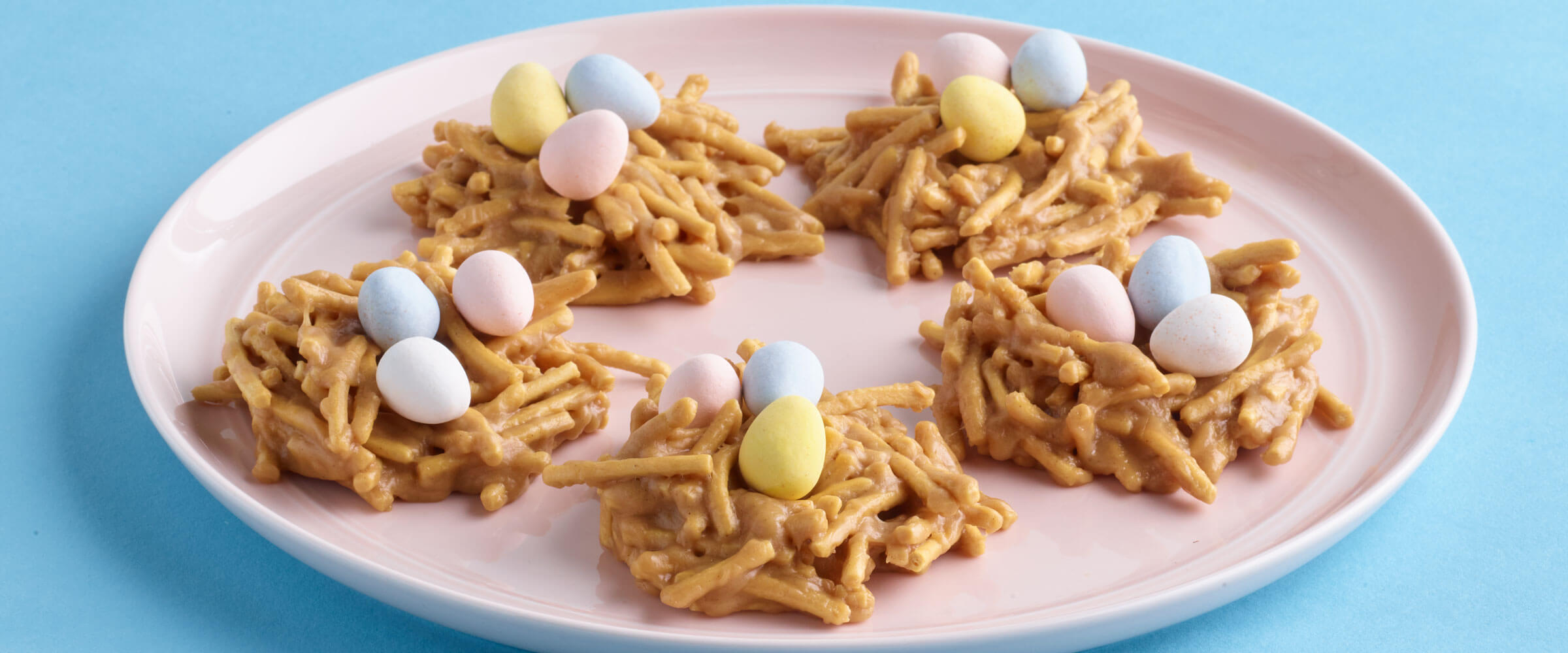 Peanut Butter Nests on a pink plate