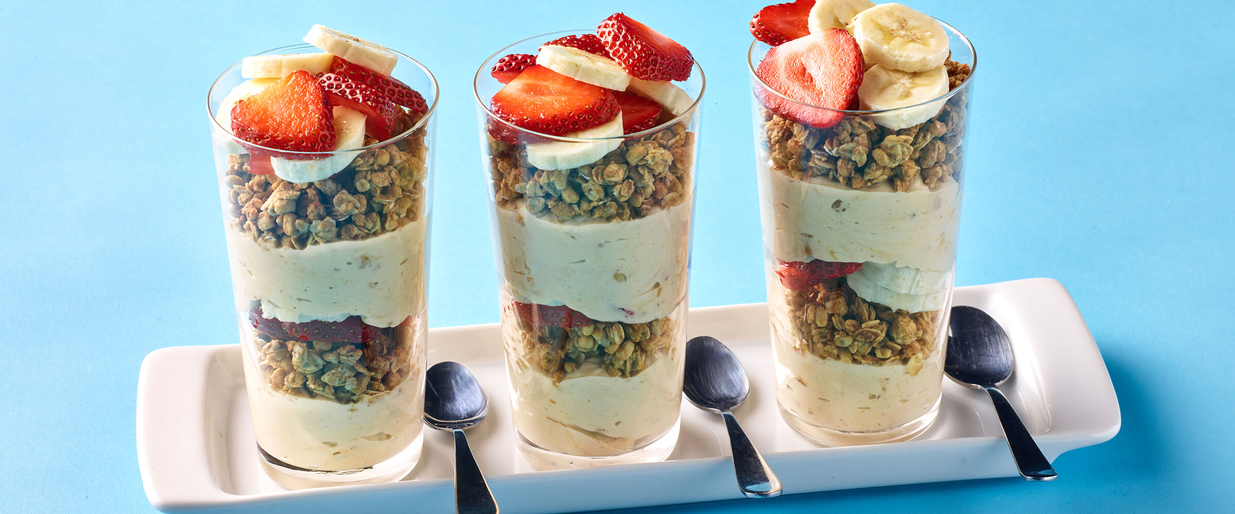 Peanut Butter Parfait topped with strawberries and banana slices